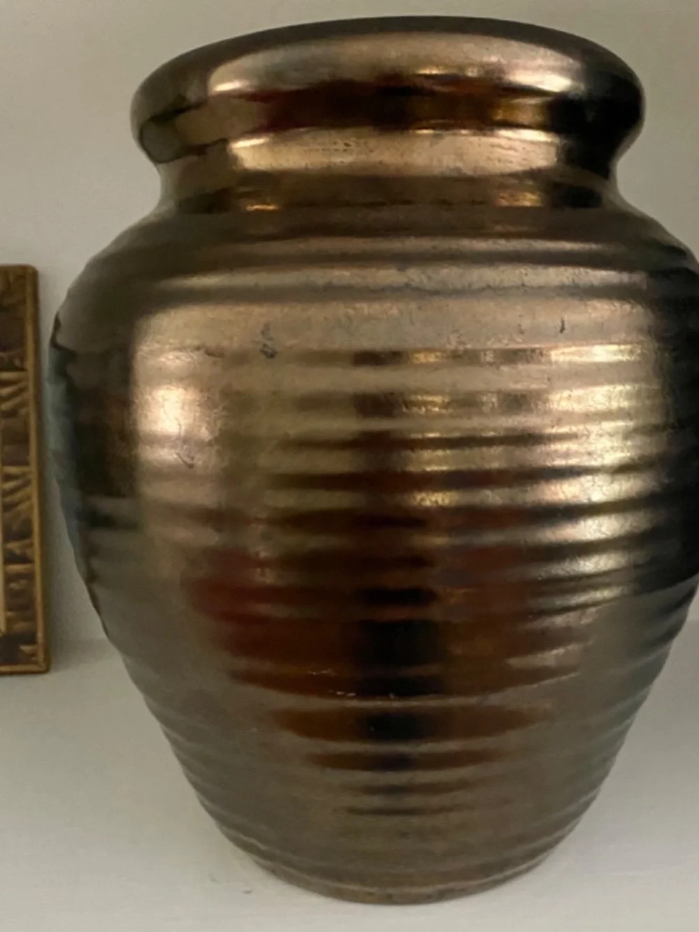 Vintage Bronze Painted Modern Ceramic Vase. Design of circular Lines on Tall Pot